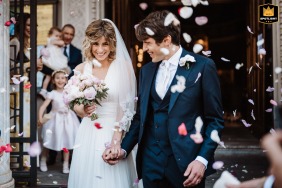 The couple beam with happiness after their marriage at Villa Cimena, Italy, posed together in elegant surroundings that mark the beginning of their new journey.
